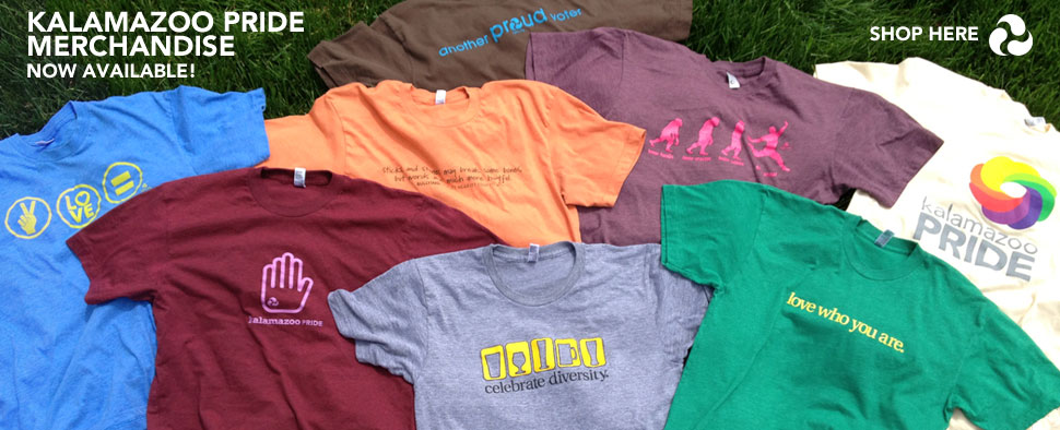 picture of shirts spread out which have kalamazoo pride logos on them